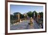 A woman carrying baskets on a yoke over the Lantern Bridge in Hoi An, Quang Nam, Vietnam, Indochina-Alex Robinson-Framed Photographic Print