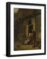 A Woman Gutting Herring in Front of Her House-Adriaen Van Ostade-Framed Art Print