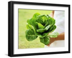 A Woman Holding a Lettuce-null-Framed Premium Photographic Print