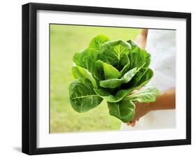 A Woman Holding a Lettuce-null-Framed Photographic Print