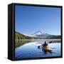 A Woman in a Sea Kayak Paddles on Trillium Lake, Oregon, USA-Gary Luhm-Framed Stretched Canvas