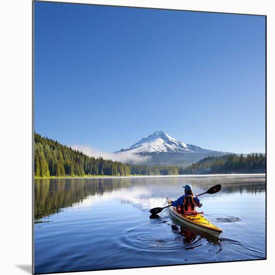 A Woman in a Sea Kayak Paddles on Trillium Lake, Oregon, USA-Gary Luhm-Mounted Photographic Print