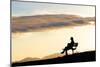 A Woman in Silhouette Sits on a Bench Along the Shelf Road Trail in Ojai California-Bennett Barthelemy-Mounted Photographic Print