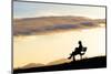 A Woman in Silhouette Sits on a Bench Along the Shelf Road Trail in Ojai California-Bennett Barthelemy-Mounted Photographic Print