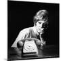 A Woman Looking at a Phone-Marisa Rastellini-Mounted Photographic Print