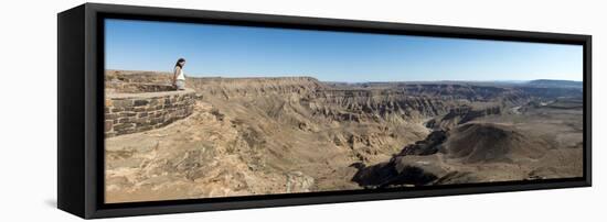 A Woman Looks into the Fish River Canyon in Southern Namibia, Africa-Alex Treadway-Framed Stretched Canvas