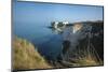 A Woman Looks Out at Old Harry Rocks at Studland Bay in Dorset on the Jurassic Coast-Alex Treadway-Mounted Photographic Print