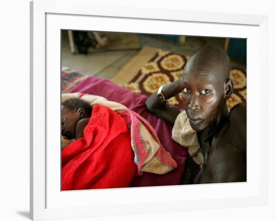 A Woman Manages to Lift Herself from the Bed-null-Framed Photographic Print