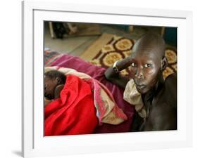 A Woman Manages to Lift Herself from the Bed-null-Framed Photographic Print