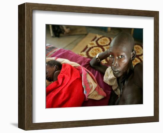 A Woman Manages to Lift Herself from the Bed-null-Framed Photographic Print