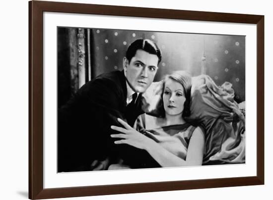 A WOMAN OF AFFAIRS, 1929 directed by CLARENCE BROWN with John Mack Brown / Greta Garbo (b/w photo)-null-Framed Photo
