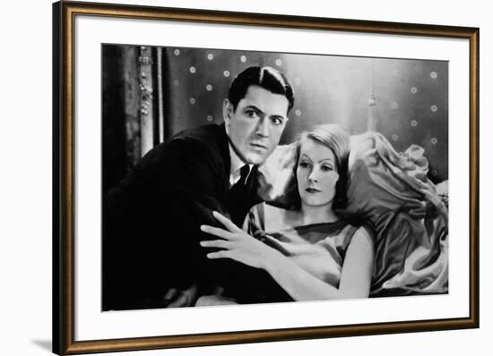 A WOMAN OF AFFAIRS, 1929 directed by CLARENCE BROWN with John Mack Brown / Greta Garbo (b/w photo)-null-Framed Photo