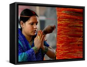 A Woman Offers Prayers to a Banyan Tree Covered by Sacred Thread-null-Framed Stretched Canvas