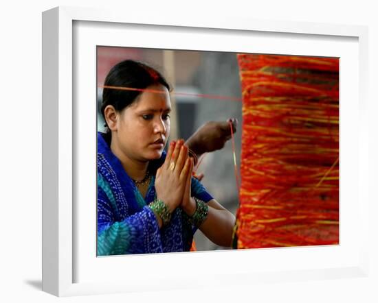 A Woman Offers Prayers to a Banyan Tree Covered by Sacred Thread-null-Framed Photographic Print