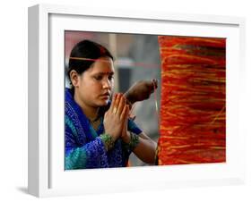 A Woman Offers Prayers to a Banyan Tree Covered by Sacred Thread-null-Framed Photographic Print