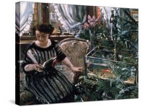 A Woman Reading Near a Goldfish Tank-Lovis Corinth-Stretched Canvas