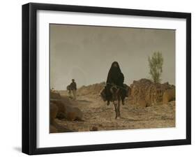 A Woman Rides a Donkey in Bamiyan Province, Central Afghanistan, September 16, 2005-Tomas Munita-Framed Photographic Print