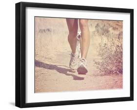 A Woman Running on a Trail with a Dog-graphicphoto-Framed Photographic Print