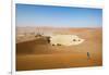 A Woman Runs Down from the Summit of Sossusvlei Sand Dune, Namibia, Africa-Alex Treadway-Framed Photographic Print