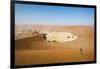 A Woman Runs Down from the Summit of Sossusvlei Sand Dune, Namibia, Africa-Alex Treadway-Framed Photographic Print