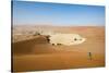 A Woman Runs Down from the Summit of Sossusvlei Sand Dune, Namibia, Africa-Alex Treadway-Stretched Canvas