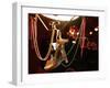 A Woman's High Heeled Shoe Hangs with Some Mardi Gras Beads-null-Framed Premium Photographic Print