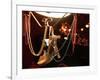 A Woman's High Heeled Shoe Hangs with Some Mardi Gras Beads-null-Framed Photographic Print