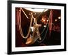 A Woman's High Heeled Shoe Hangs with Some Mardi Gras Beads-null-Framed Photographic Print