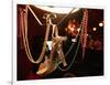 A Woman's High Heeled Shoe Hangs with Some Mardi Gras Beads-null-Framed Photographic Print