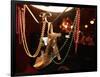 A Woman's High Heeled Shoe Hangs with Some Mardi Gras Beads-null-Framed Photographic Print