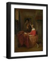 A Woman Seated at a Table and a Man Tuning a Violin, C. 1657?1658-Gabriel Metsu-Framed Giclee Print