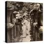 A Woman Shinto Devotee Counting the Stone Lanterns, Kasuga Shrine, Nara, Japan, 1904-Underwood & Underwood-Stretched Canvas