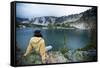 A Woman Sits at Dusk Near Mirror Lake in the Wallowa Mountains in Northeast Oregon-Ben Herndon-Framed Stretched Canvas