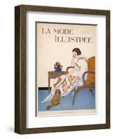 A Woman Sits on a Chair with a Hat in Her Hand and a Dog at Her Feet-null-Framed Art Print