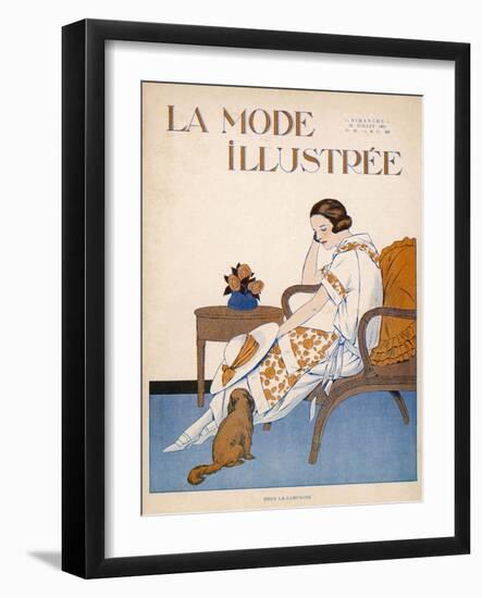 A Woman Sits on a Chair with a Hat in Her Hand and a Dog at Her Feet-null-Framed Art Print