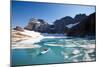 A Woman Stand Up Paddles (SUP) Among Floating Chunks Of Ice On Upper Grinell Lake-Ben Herndon-Mounted Photographic Print