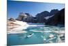 A Woman Stand Up Paddles (SUP) Among Floating Chunks Of Ice On Upper Grinell Lake-Ben Herndon-Mounted Photographic Print