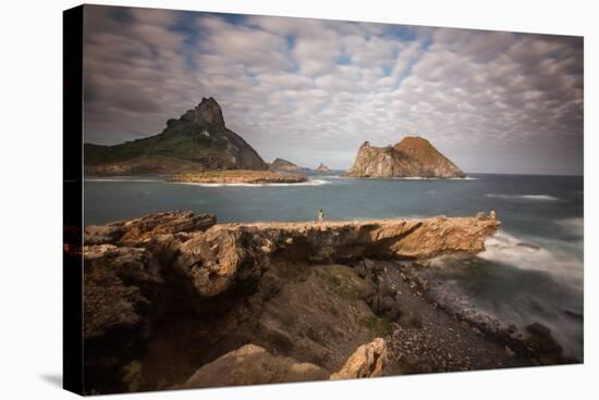 A Woman Stares Out at the Dramatic Landscape of Praia Do Sueste on Fernando De Noronha-Alex Saberi-Stretched Canvas