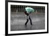 A Woman Struggles to Hold an Umbrella as She Walks Through a Storm in Beijing-David Gray-Framed Photographic Print