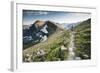 A Woman Trail Running High in Glacier National Park, Montana-Steven Gnam-Framed Photographic Print