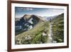 A Woman Trail Running High in Glacier National Park, Montana-Steven Gnam-Framed Photographic Print