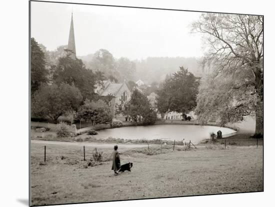 A Woman Walking Her Border Collie Dog in the Countryside-null-Mounted Photographic Print