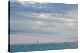 A Woman Walks across the Dunes in Brazil's Lencois Maranhenses National Park-Alex Saberi-Stretched Canvas