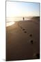 A Woman Walks Down A Secluded Beach On Sicily's Southern Coast-Erik Kruthoff-Mounted Photographic Print