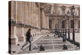 A Woman Walks Through the Louvre Museum in Paris, France, Europe-Julian Elliott-Stretched Canvas