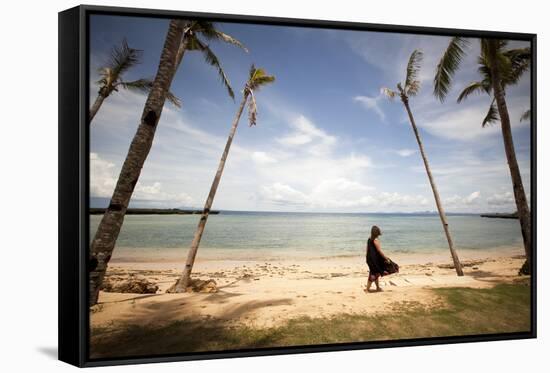 A Woman Walks with Her Shoes Off on the Beach Near the Exclusive Balesin Island Club, Philippines-Carlo Acenas-Framed Stretched Canvas