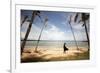 A Woman Walks with Her Shoes Off on the Beach Near the Exclusive Balesin Island Club, Philippines-Carlo Acenas-Framed Photographic Print