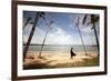 A Woman Walks with Her Shoes Off on the Beach Near the Exclusive Balesin Island Club, Philippines-Carlo Acenas-Framed Photographic Print