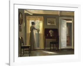 A Woman watering a Plant by a Window, 1915-Alfred Broge-Framed Giclee Print