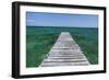 A Wood Dock in the Foreground with Clear Green Water and Blue Skies Near the Isle of Youth, Cuba-James White-Framed Photographic Print